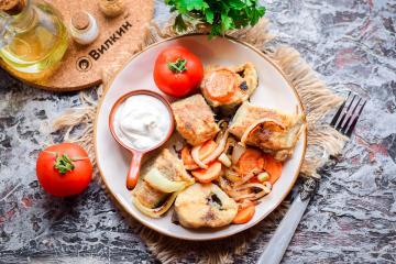 Pollock al horno con zanahorias y cebollas