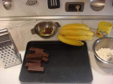 Inusual, delicioso, delicado postre "plátano del chocolate". Y perdonador.